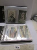 2 albums of postcards including topographical, actresses etc.