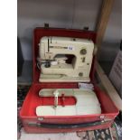 A Bernina Minimatic sewing machine in case