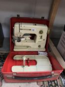 A Bernina Minimatic sewing machine in case