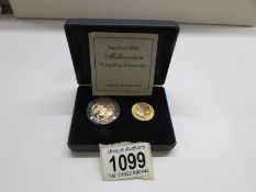 2 cased Millenium gold sovereigns.