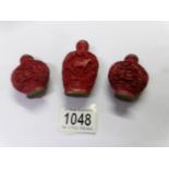 3 oriental snuff bottles.