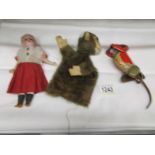 A German tin plate monkey toy,