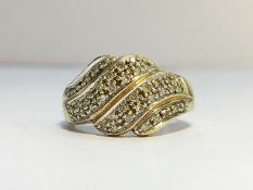 A 9ct gold & pave diamonds twist ring