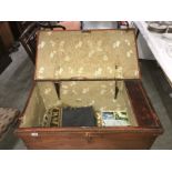 A blanket box with key and contents including Victorian table cover (a/f).