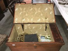 A blanket box with key and contents including Victorian table cover (a/f).