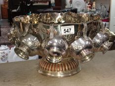 A silver plated lion head handle punch bowl with 8 cups
