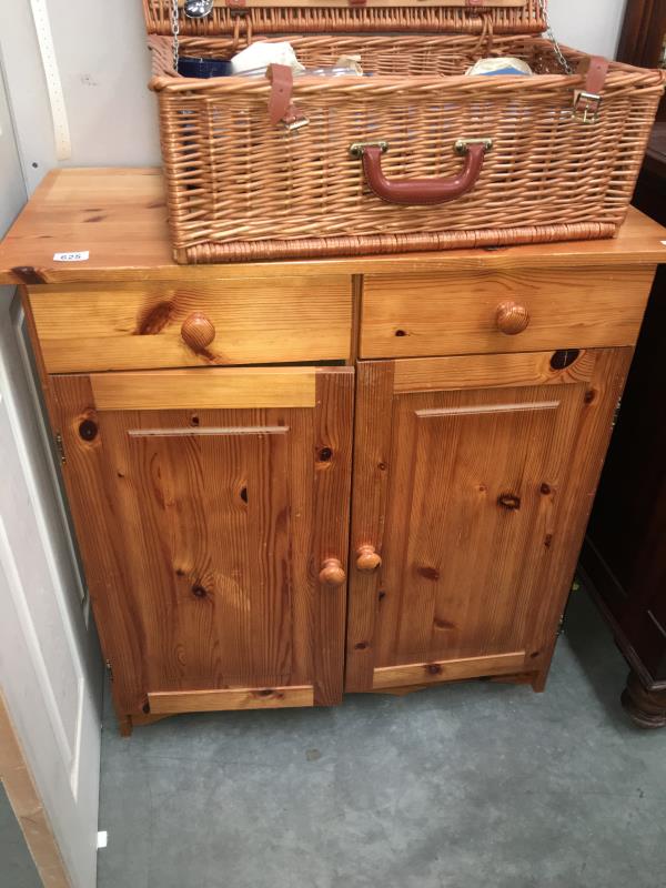 A pine 2 drawer 2 door cabinet