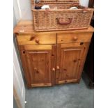 A pine 2 drawer 2 door cabinet