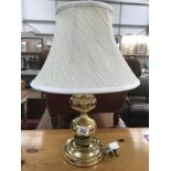 A brass table lamp