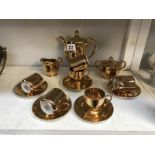 A 1920's gold plated porcelain genuine Samurai china set,