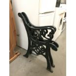 A pair of cast iron bench ends