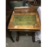 A Victorian inlaid Davenport.