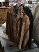 2 fur coats (1 faux)