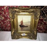 A gilt framed oil on board seascape.