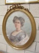 A gilt framed oval portrait entitled Bethia Clarke.