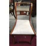 An inlaid mahogany chair