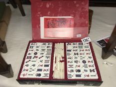 A Gibson games bamboo backed mahjong set.