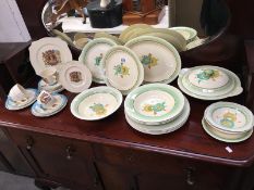 A collection of Clarice Cliff dinnerware (some with additional markings including Wilkinson) & 1953