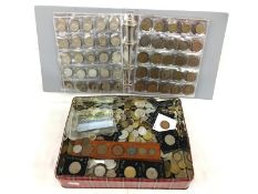 A tin & album of British & Foreign coins