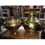 A brass jardiniere and a brass vase.