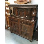 An oak court cupboard