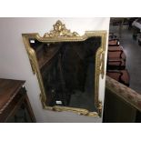 A French second empire style gilt framed mirror a/f.