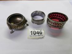 2 silver salts and a silver napkin ring.