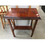 A dark wood side table