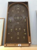 A bagatelle wooden game