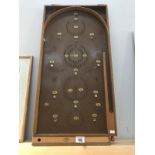 A bagatelle wooden game