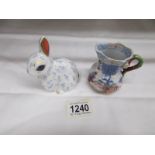 A small Mason's jug and a Royal Crown Derby rabbit paperweight.