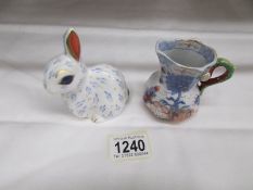 A small Mason's jug and a Royal Crown Derby rabbit paperweight.