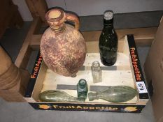 A quantity of glass advertising bottles & 1 other item