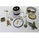 A mixed lot of jewellery including silver pendant, other pendants, brooches, watches etc.