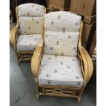 A pair of bamboo conservatory chairs