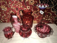 7 items of Cranberry glass.