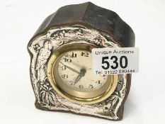 An Art neuveau silver fronted clock