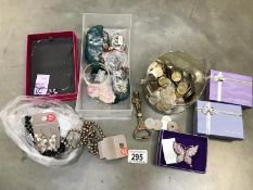 A mixed lot of costume jewellery and foreign coins