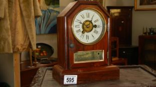 A Seth Thomas mantle clock with alarm