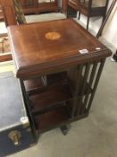 A Victoria inlaid revolving bookcase.