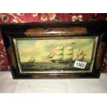 A framed and glazed painting of a tall ship signed W Webb.