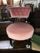 A Victorian salon chair.