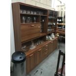 A pair of modern wall units (1 with drinks cabinet) both on casters