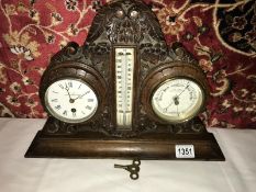 An Edwardian carved oak clock/barometer/thermometer by J Spiers, Leighton Buzzard.