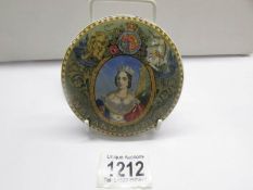 A very rare 19th century Prattware pot lid, green banded and depicting 'Young Victoria'.