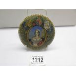 A very rare 19th century Prattware pot lid, green banded and depicting 'Young Victoria'.