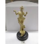 An art deco gilded metal figurine.