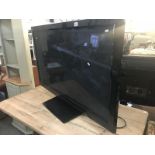 A large Panasonic flatscreen TV.