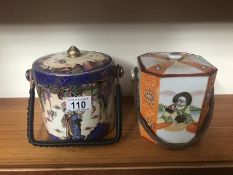 2 oriental style biscuit barrels.