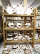 Approximately 30 pieces of Royal Albert Old Country Roses tea ware including clock and cake stand.